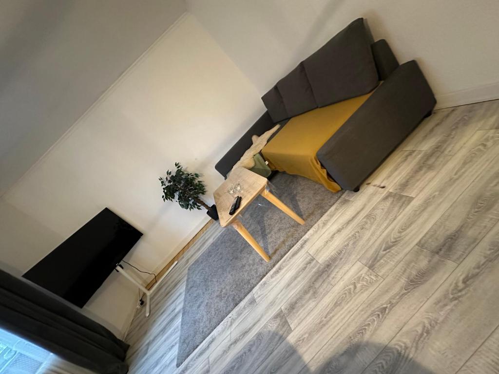 an overhead view of a living room with a couch at Apartment In Most Pop-ular Area Nørrebro in Copenhagen