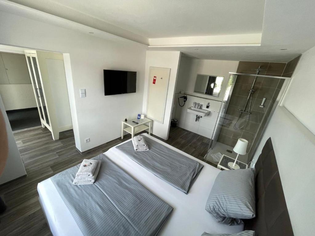 TV a/nebo společenská místnost v ubytování Hotel Leitner