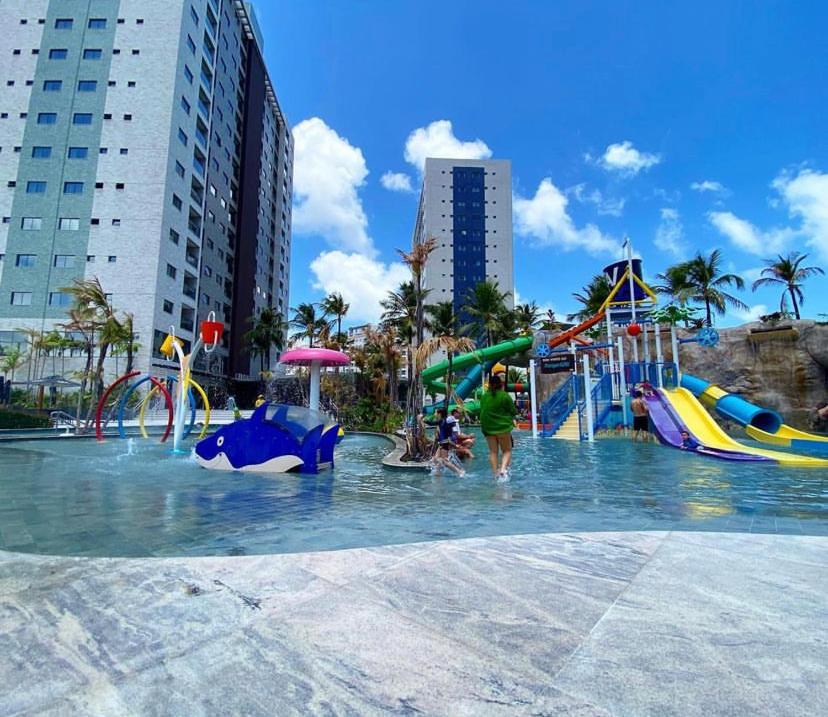 a water park with children playing in the water at Salinas Premium Resort in Salinópolis