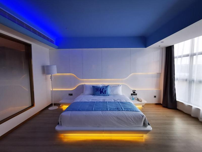Postel nebo postele na pokoji v ubytování LanOu Hotel Shaoyang Shangbang Jiayuan