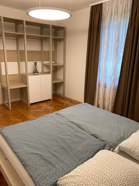 Postel nebo postele na pokoji v ubytování Apartment Nona Polda