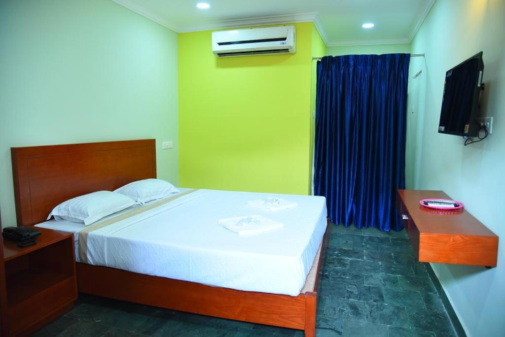 Postel nebo postele na pokoji v ubytování HOTEL KING PARK