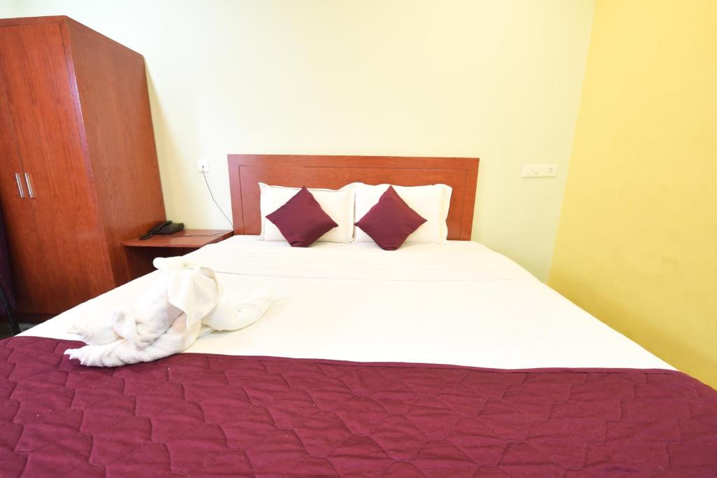 Postel nebo postele na pokoji v ubytování HOTEL KING PARK