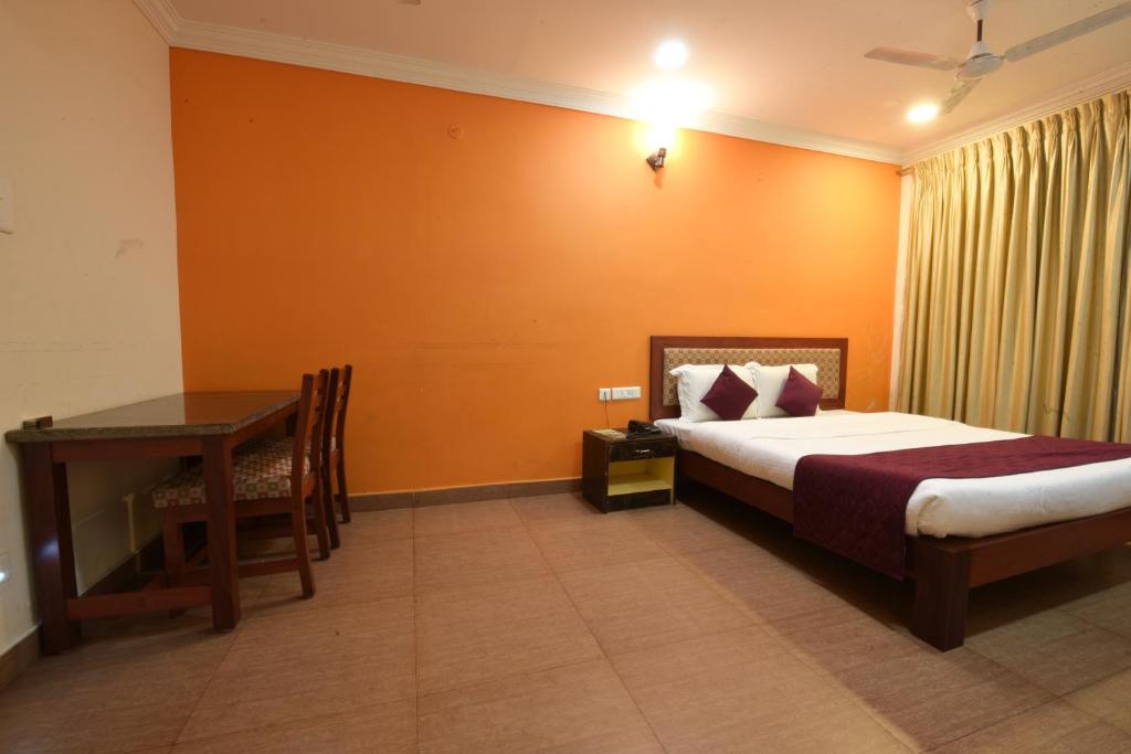 Postel nebo postele na pokoji v ubytování HOTEL KING PARK