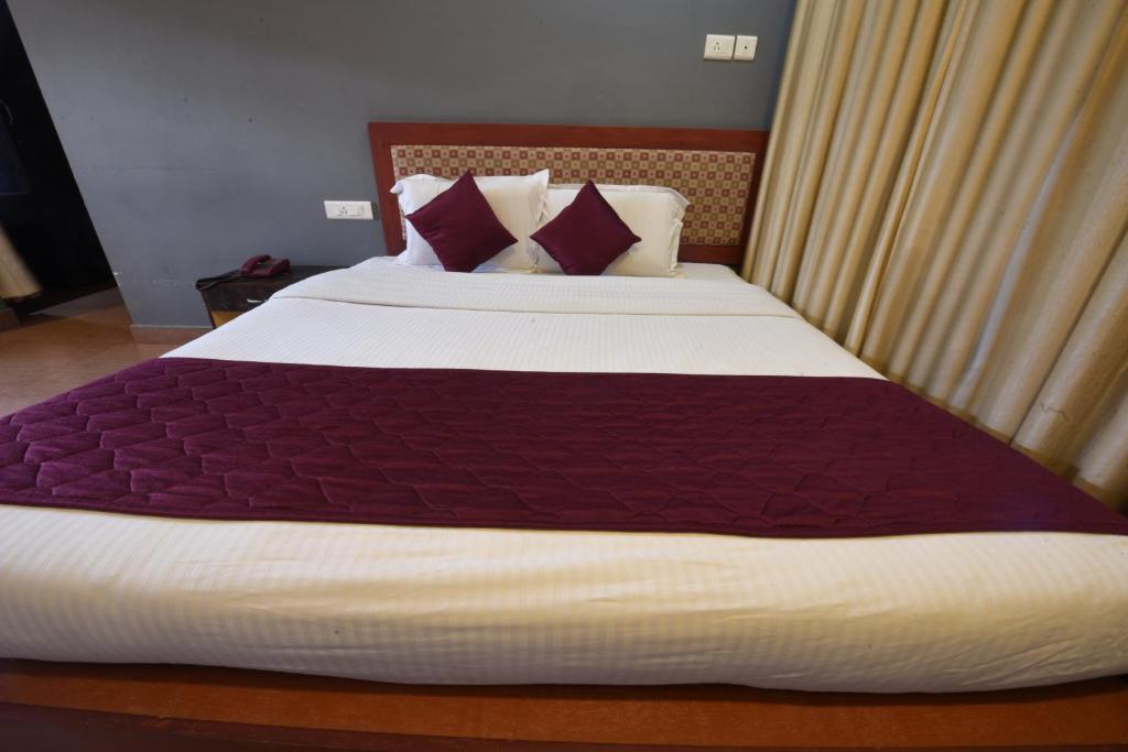 Postel nebo postele na pokoji v ubytování HOTEL KING PARK