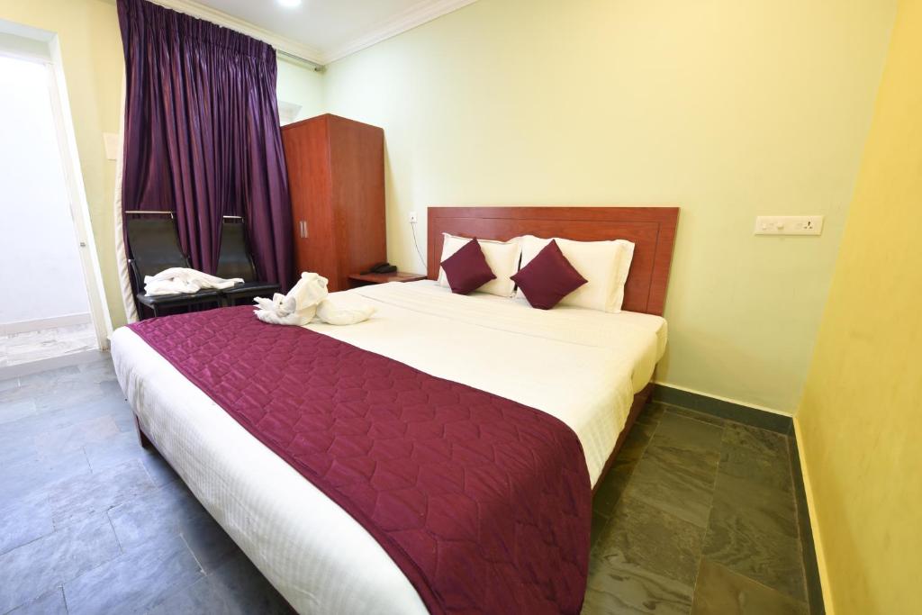 Postel nebo postele na pokoji v ubytování HOTEL KING PARK