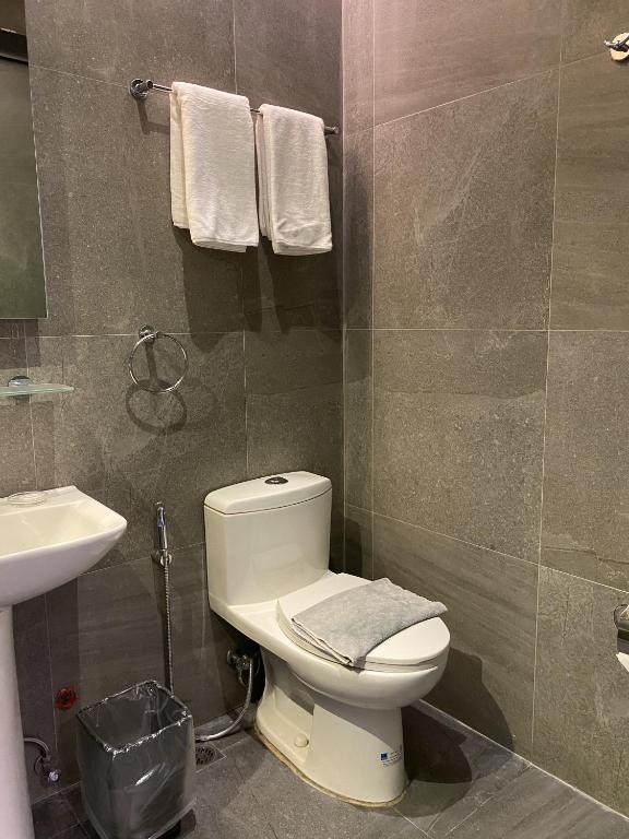 Koupelna v ubytování Solace Hotel