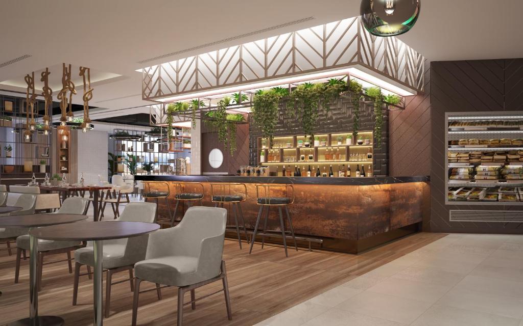 DAMAC Hills 2 Hotel, an Edge by Rotana Hotel - Resim 4