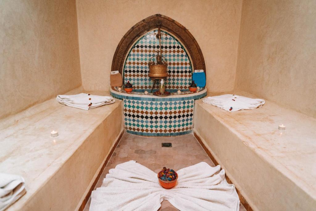 Postel nebo postele na pokoji v ubytování Equity Point Marrakech