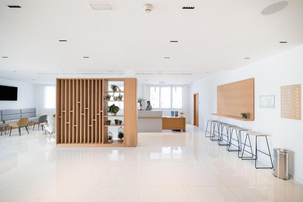 A television and/or entertainment centre at Petit Sagitario Adults only