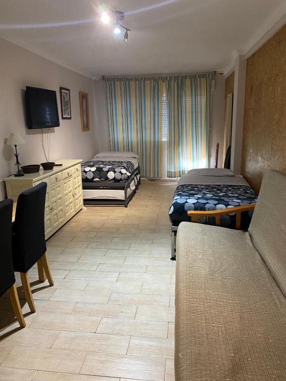 Postel nebo postele na pokoji v ubytování Rebeca Rooms