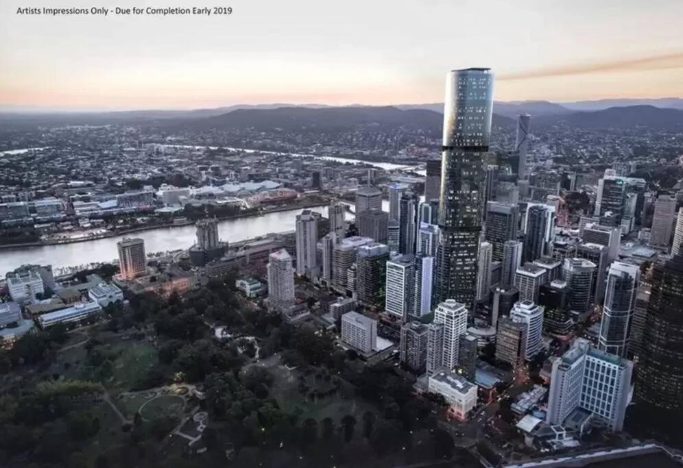 an aerial view of a city with a river and skyscrapers at New! Great Value - Skytower center of CBD in Brisbane