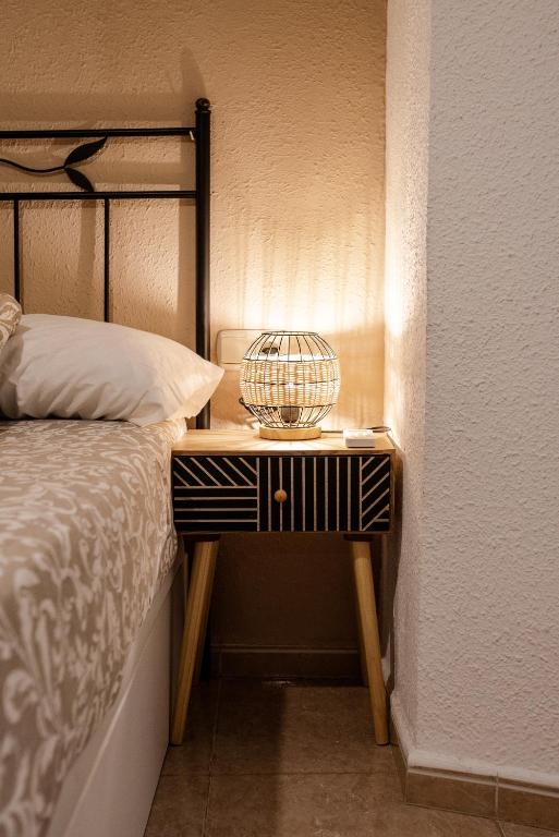A bed or beds in a room at Lazcano Málaga by DV Properties