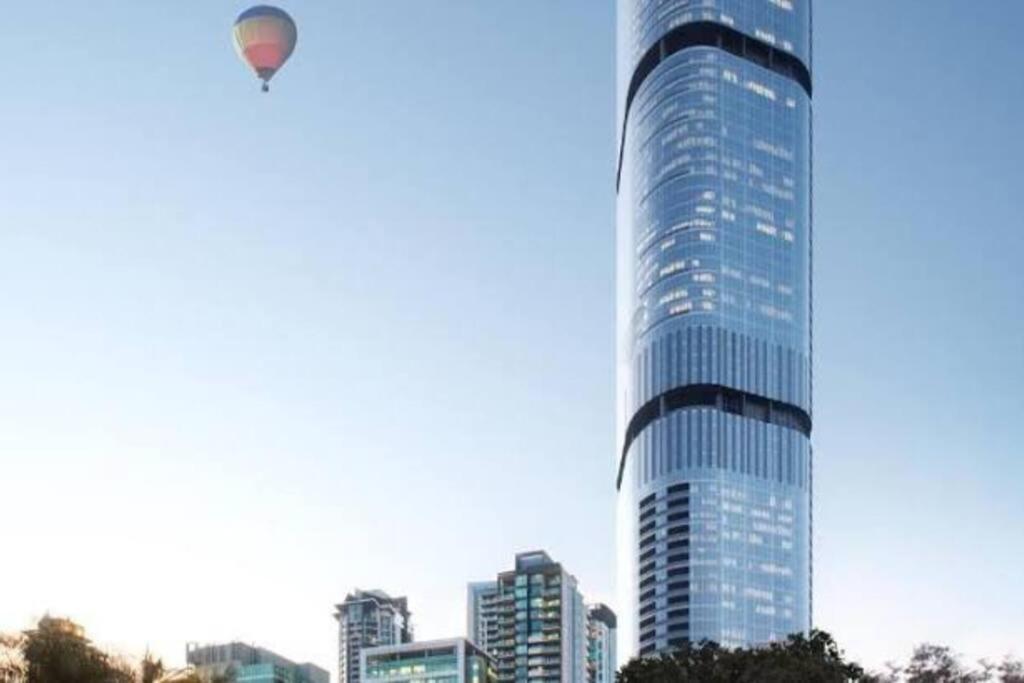 a tall building with a hot air balloon in front of it at 2 bedroom in the center of CBD in Brisbane