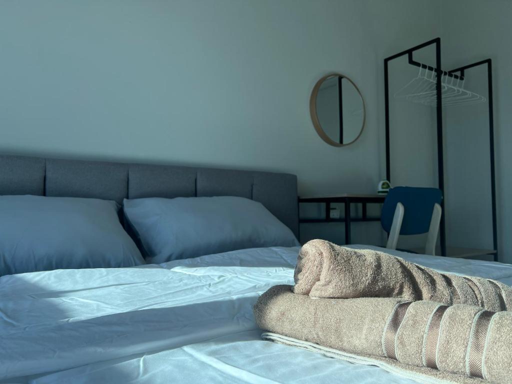 Katil atau katil-katil dalam bilik di TK Homestay - Sea View and Mount Kinabalu View