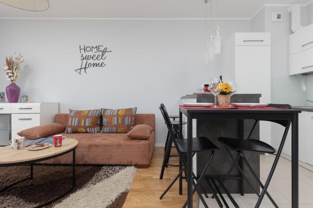 Posedenie v ubytovaní Warsaw Young City Apartment by Noclegi Renters