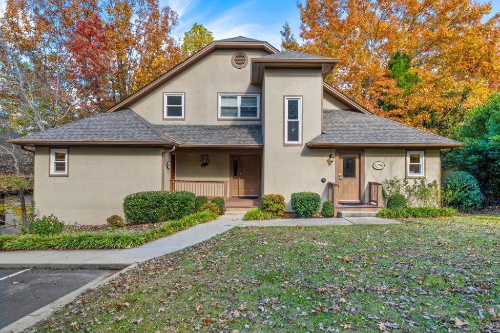 a house with a driveway in front of it at Nacoochee in Helen