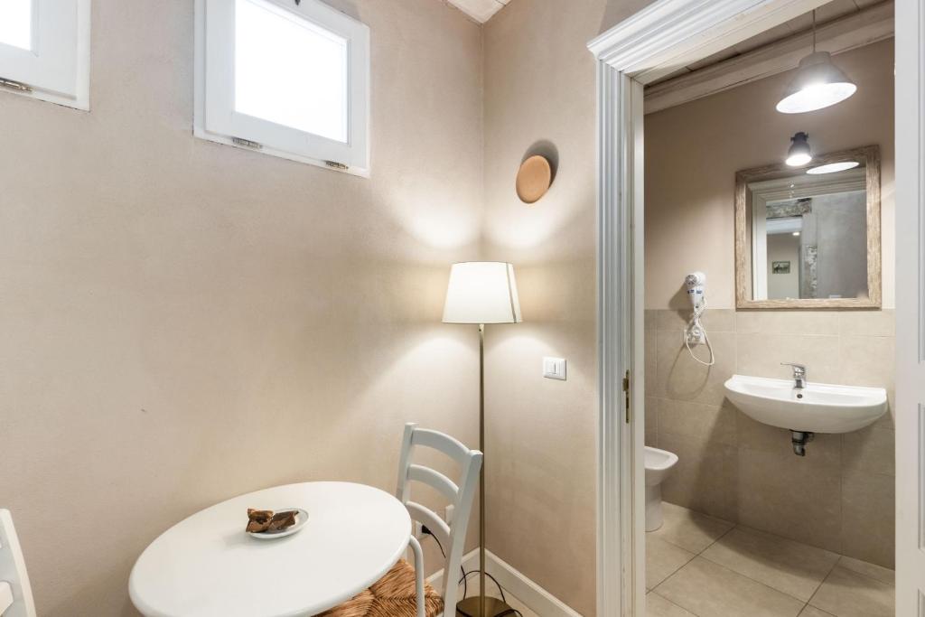 Koupelna v ubytování Dedalo Rooms