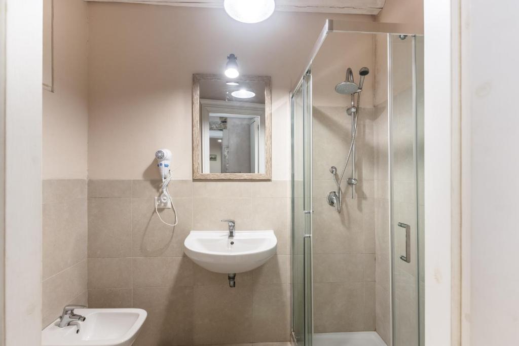 Koupelna v ubytování Dedalo Rooms