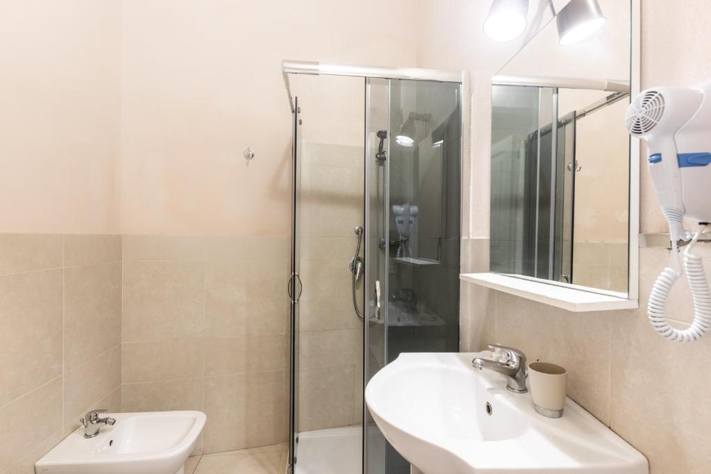Koupelna v ubytování Dedalo Rooms