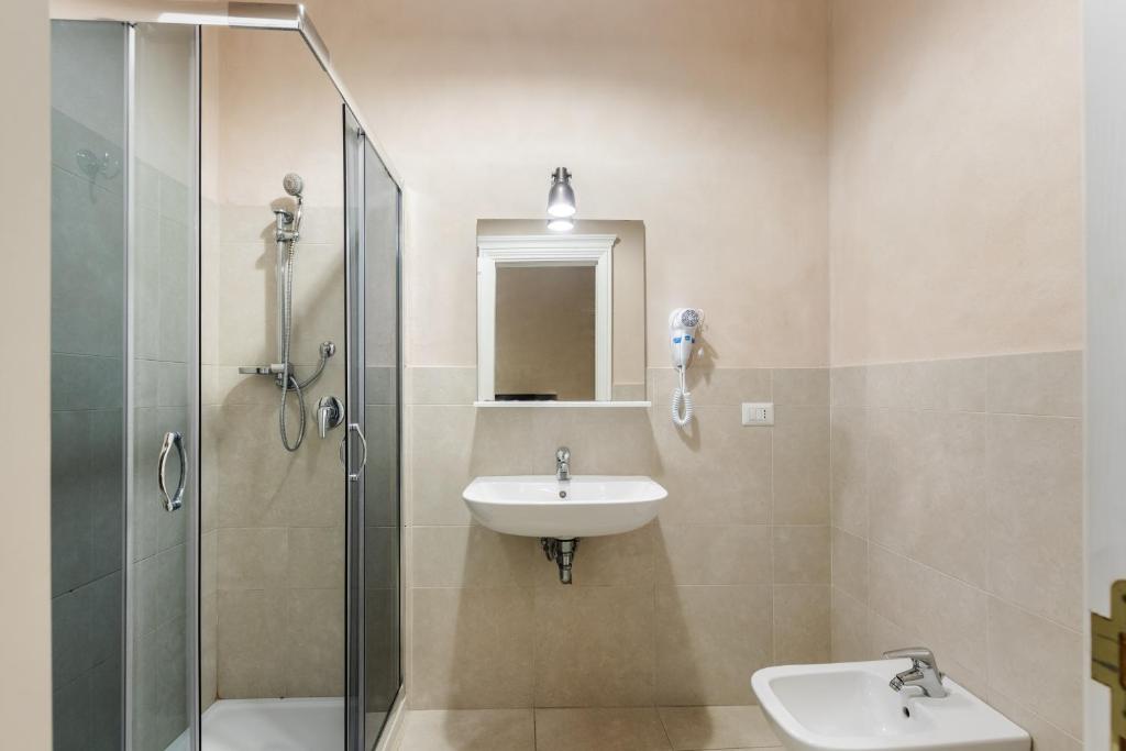 Koupelna v ubytování Dedalo Rooms