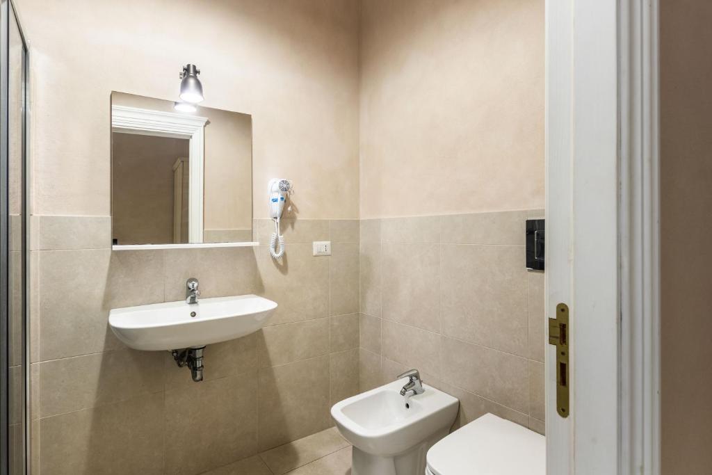 Koupelna v ubytování Dedalo Rooms