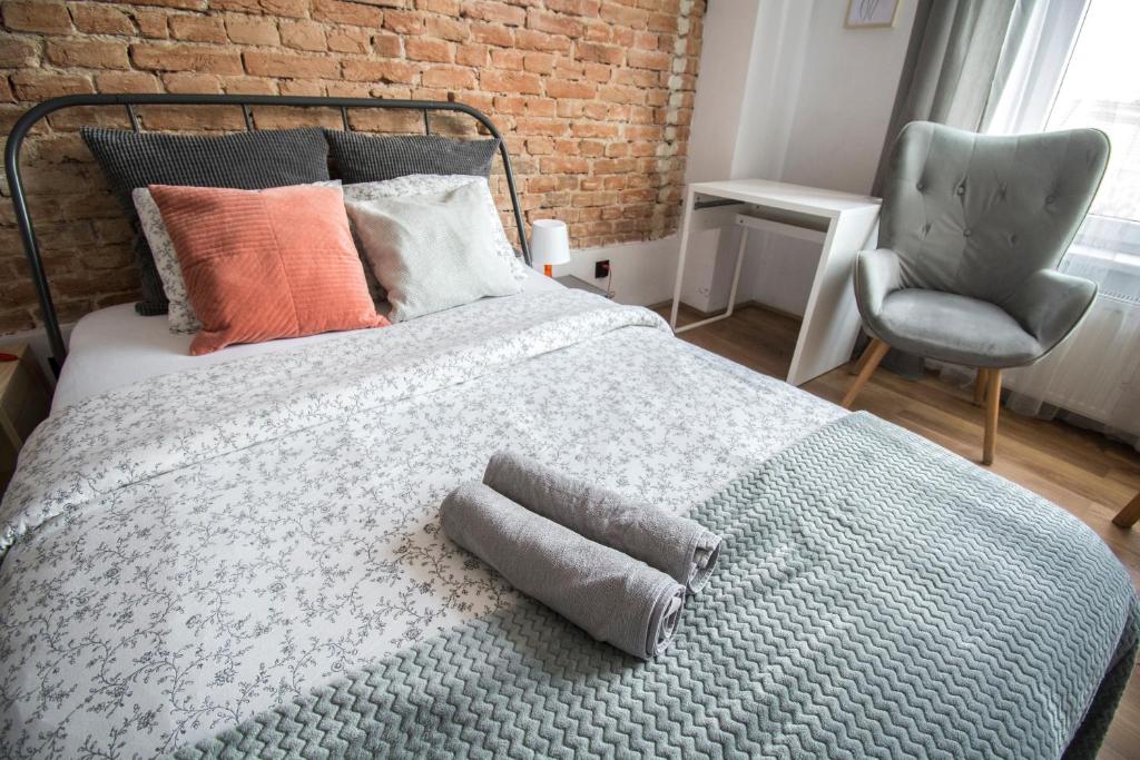Posteľ alebo postele v izbe v ubytovaní LION apartments - SILVER