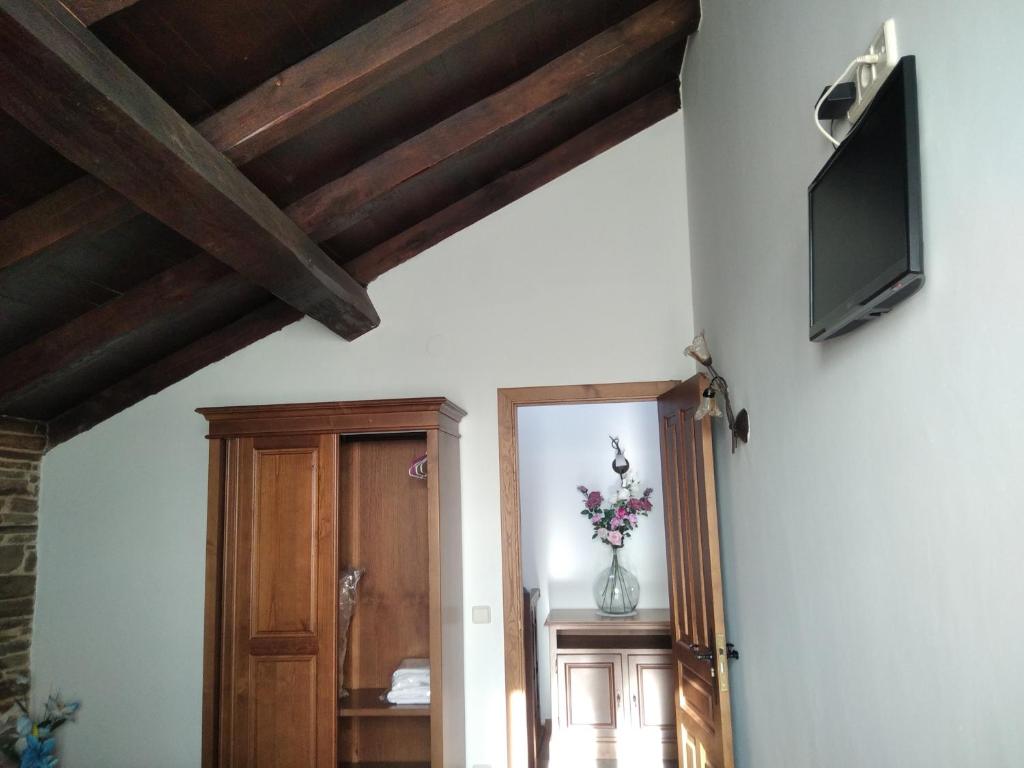TV a/nebo společenská místnost v ubytování La Posada de Oscos