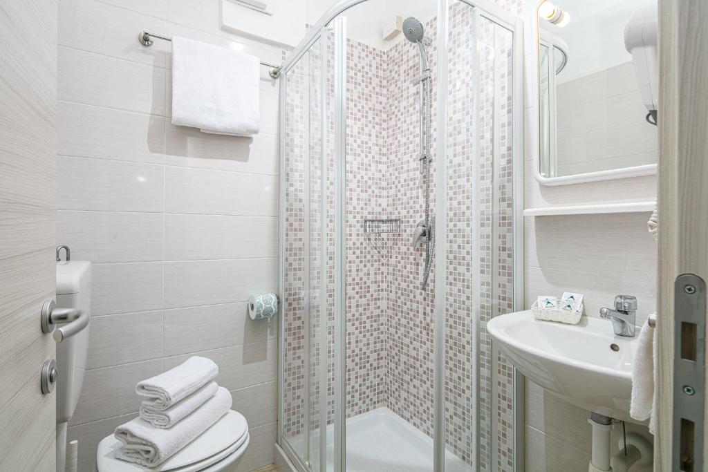 Koupelna v ubytování Hotel Pigalle