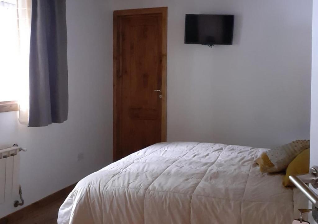 Postel nebo postele na pokoji v ubytování Paso Puyehue