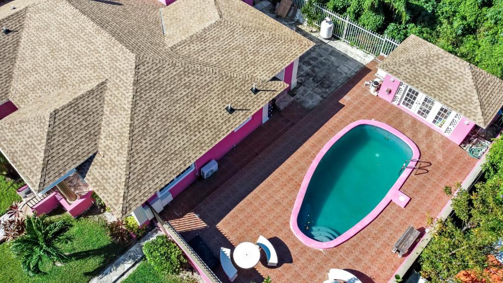 an overhead view of a house with a swimming pool at Cocoplum Rest N Hideaway #2 in Nassau