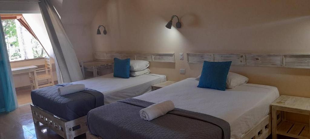 Katil atau katil-katil dalam bilik di guest house MY WAY