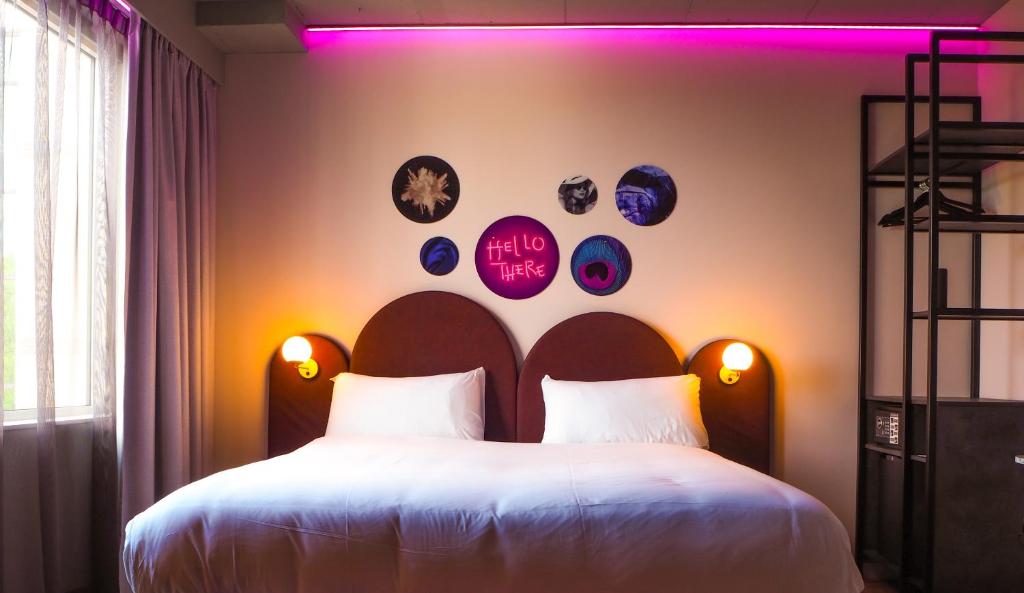 Postel nebo postele na pokoji v ubytování Hotel VIC