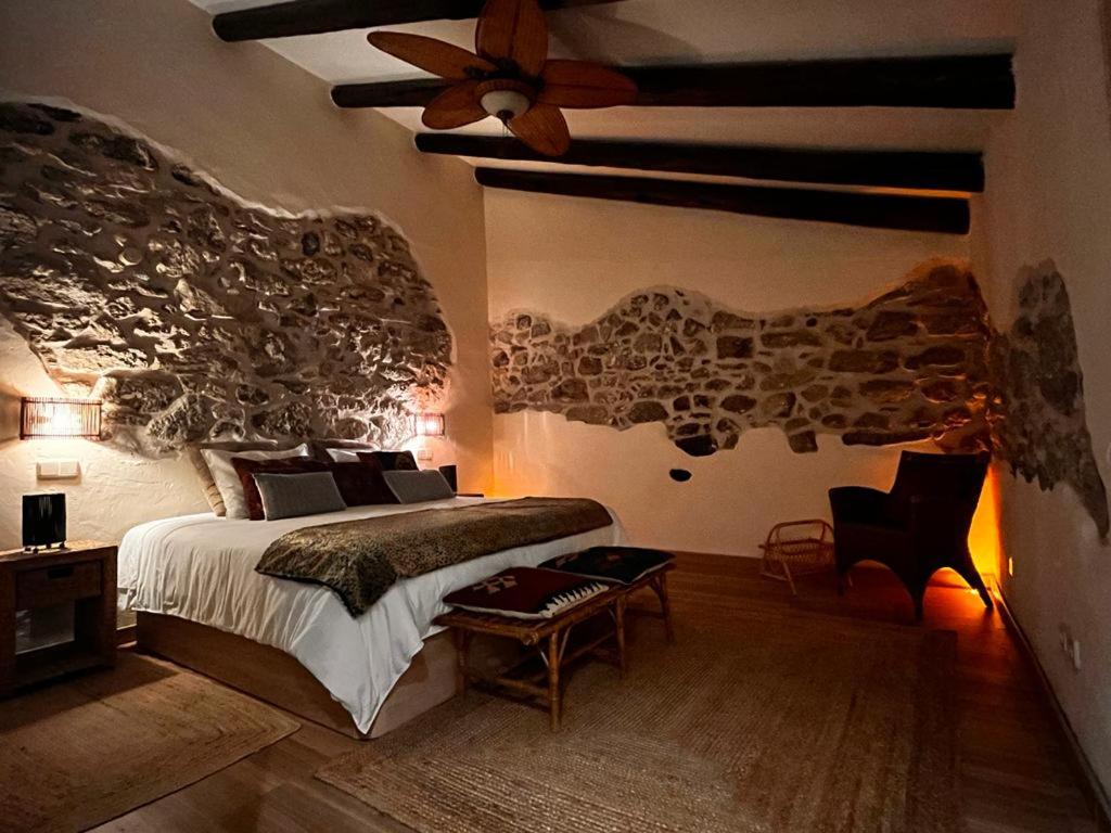 A bed or beds in a room at El Quinto de Luciañez