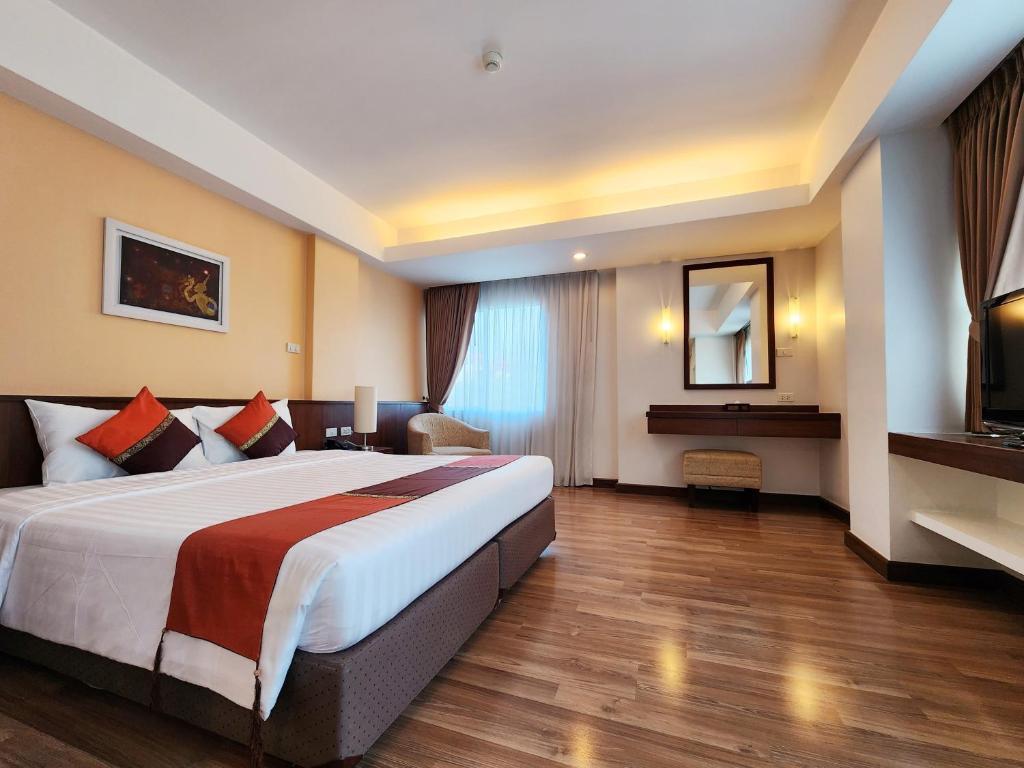 Postel nebo postele na pokoji v ubytování Avion Hotel