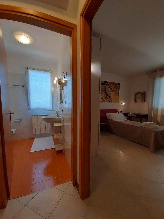 Postel nebo postele na pokoji v ubytování Casa di Clara