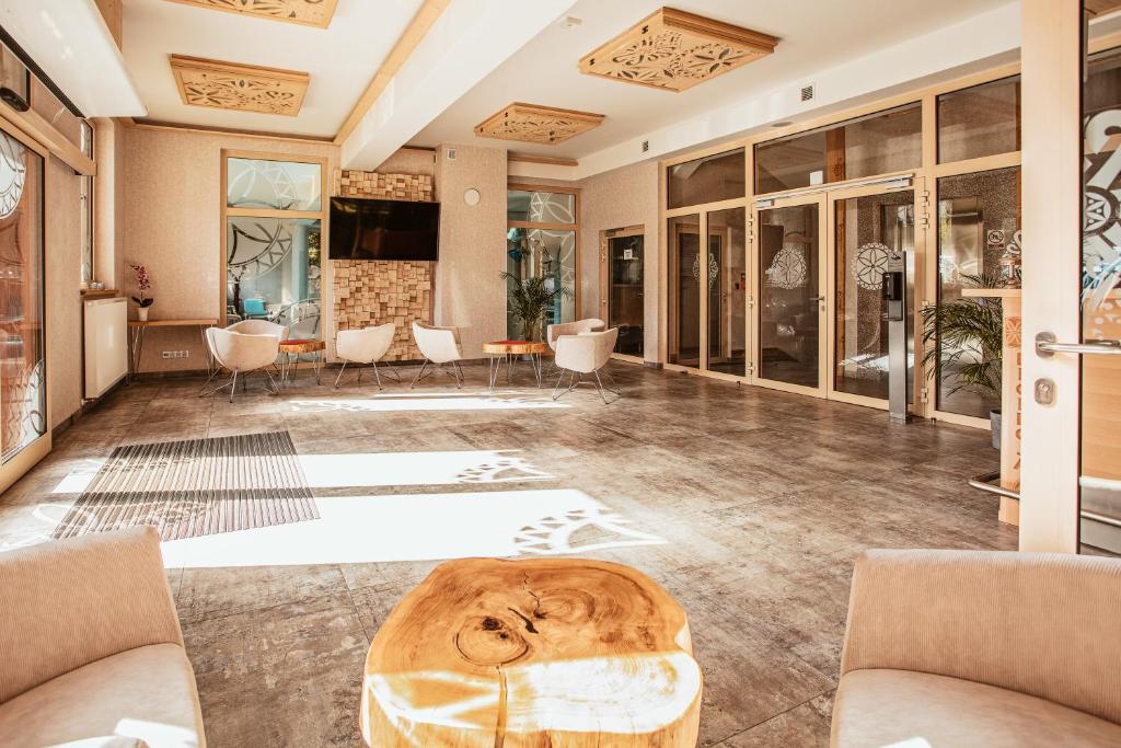 Posezení v ubytování Villa Cannes Resort Zakopane - grota solna, sauna fińska