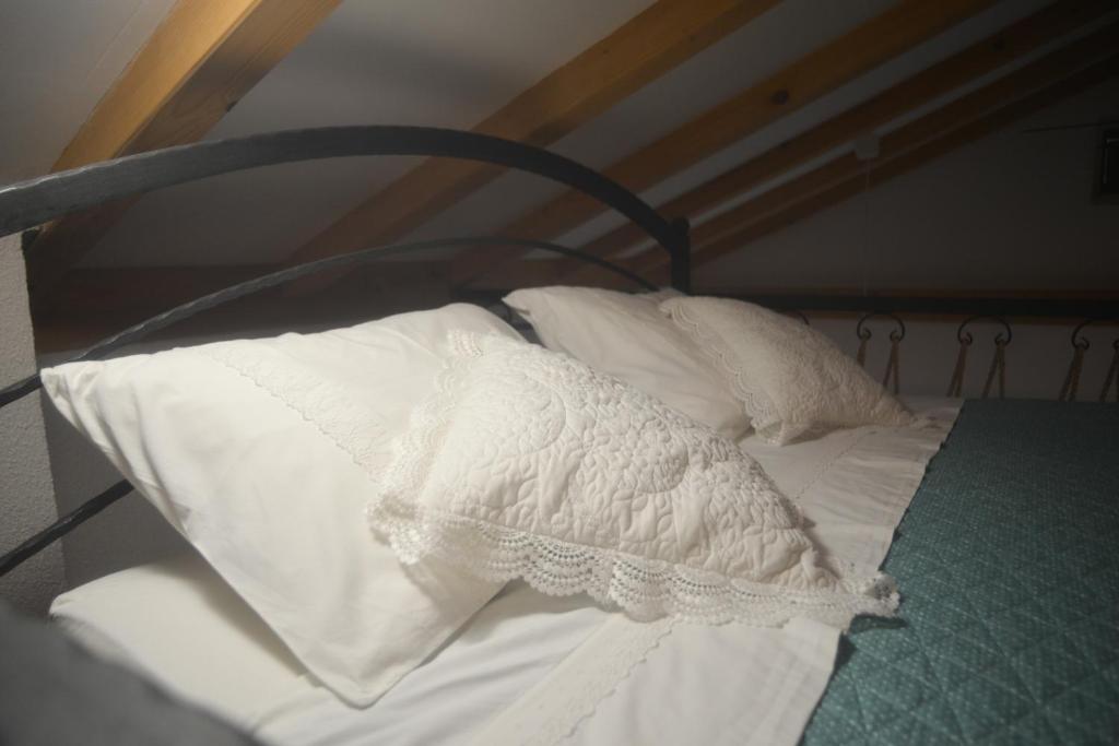 Posteľ alebo postele v izbe v ubytovaní Beach House Marina Grande