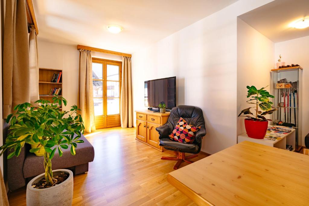 TV a/nebo společenská místnost v ubytování das Cityhouse