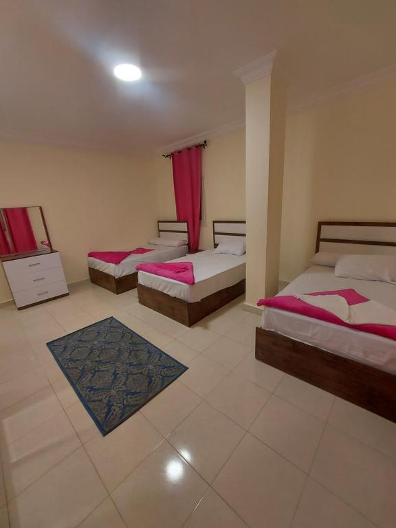 Ένα ή περισσότερα κρεβάτια σε δωμάτιο στο Smile Apartment