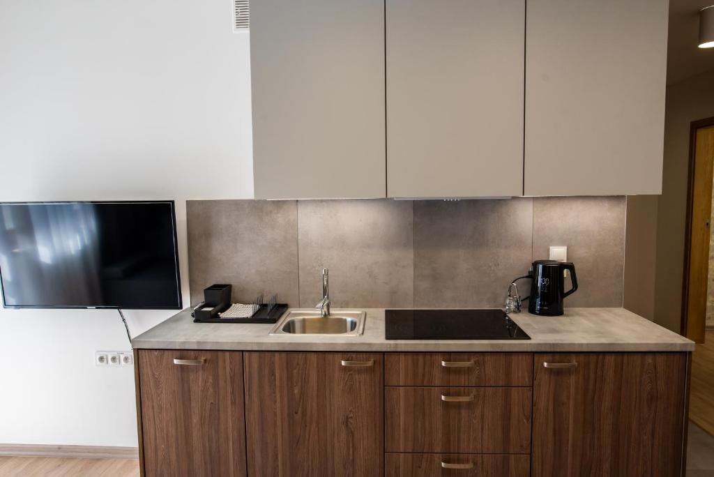 Kuchyň nebo kuchyňský kout v ubytování Apartamenty Leśne Zacisze