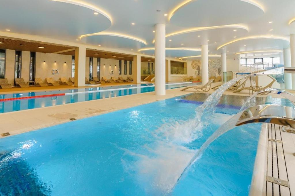 Bazén v ubytování Aqua Polanki Bodnar Apartments nebo v jeho okolí