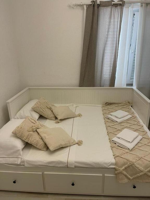 Posteľ alebo postele v izbe v ubytovaní Vila Kata