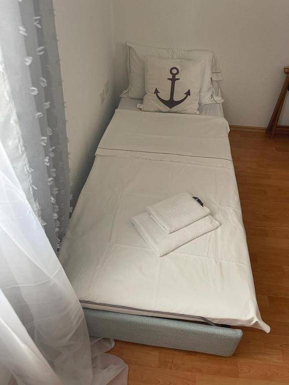 Posteľ alebo postele v izbe v ubytovaní Vila Kata