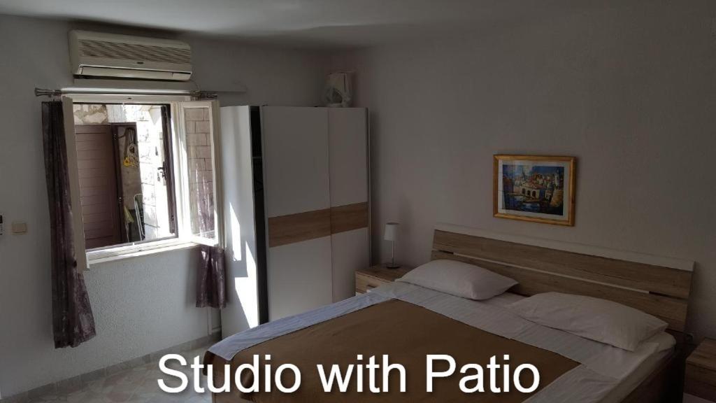 Posteľ alebo postele v izbe v ubytovaní Apartments Budman