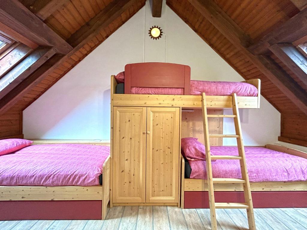 Posteľ alebo postele v izbe v ubytovaní Mandi Mandi a Tarvisio