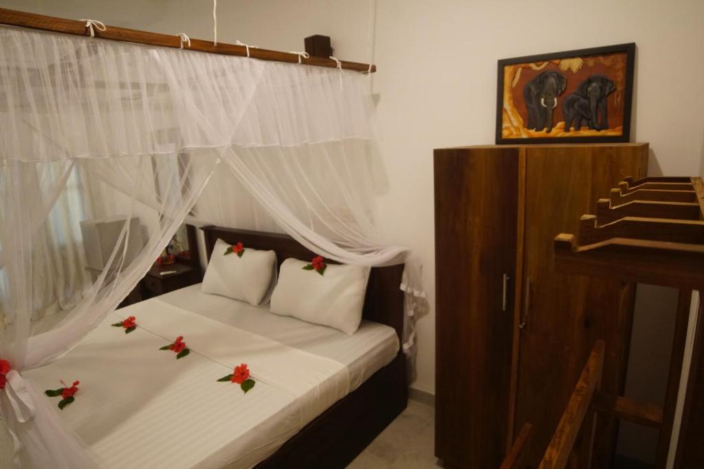 Postel nebo postele na pokoji v ubytování Turtle Bay Beach Resort