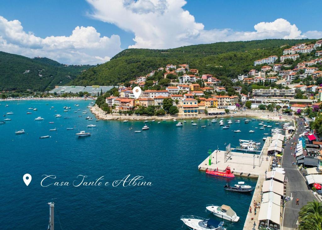 a group of boats in a body of water at Casa Santo e Albina Rabac in Rabac
