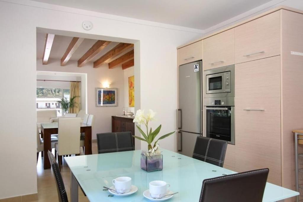 A kitchen or kitchenette at Modern villa 300m from crystal clear coves by Renthousing
