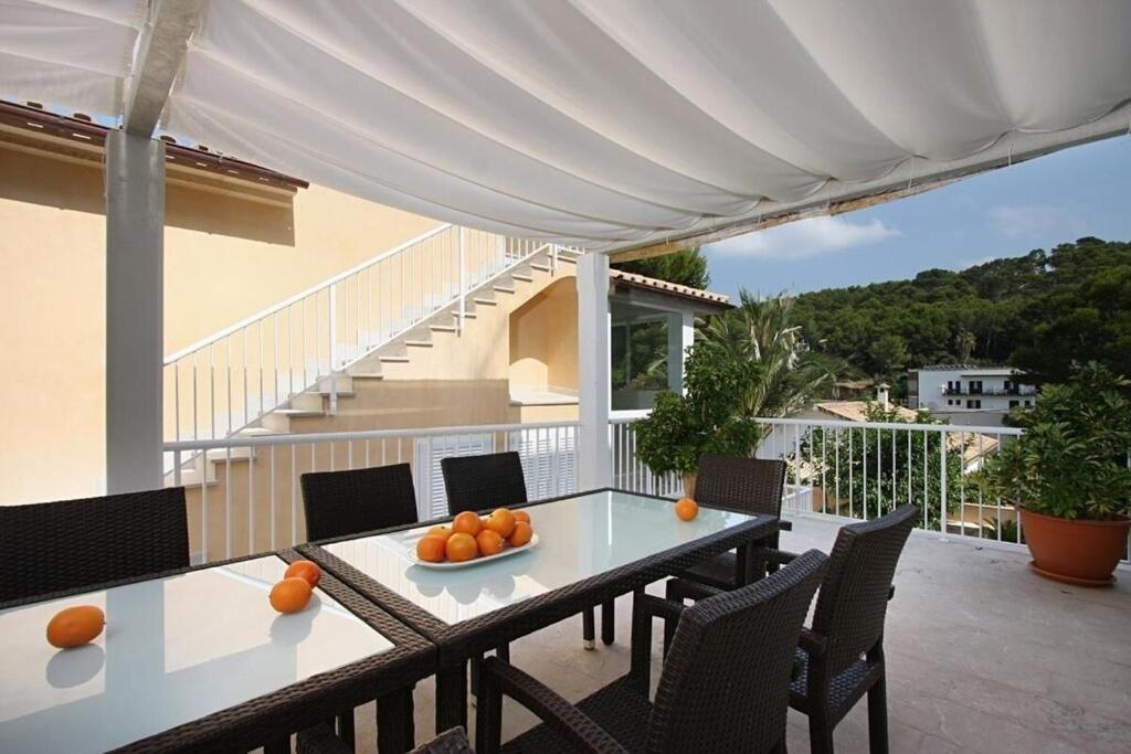 A balcony or terrace at Modern villa 300m from crystal clear coves by Renthousing